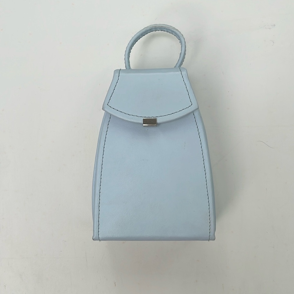 Travel Jewelry Case Wolf Designs Inc in baby blue. Take your favorite pieces